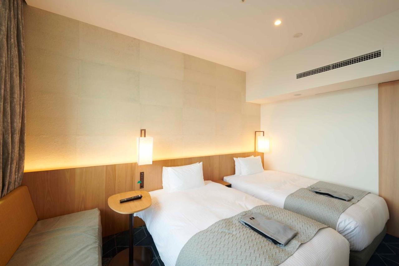 גוטמבה Hotel Clad מראה חיצוני תמונה