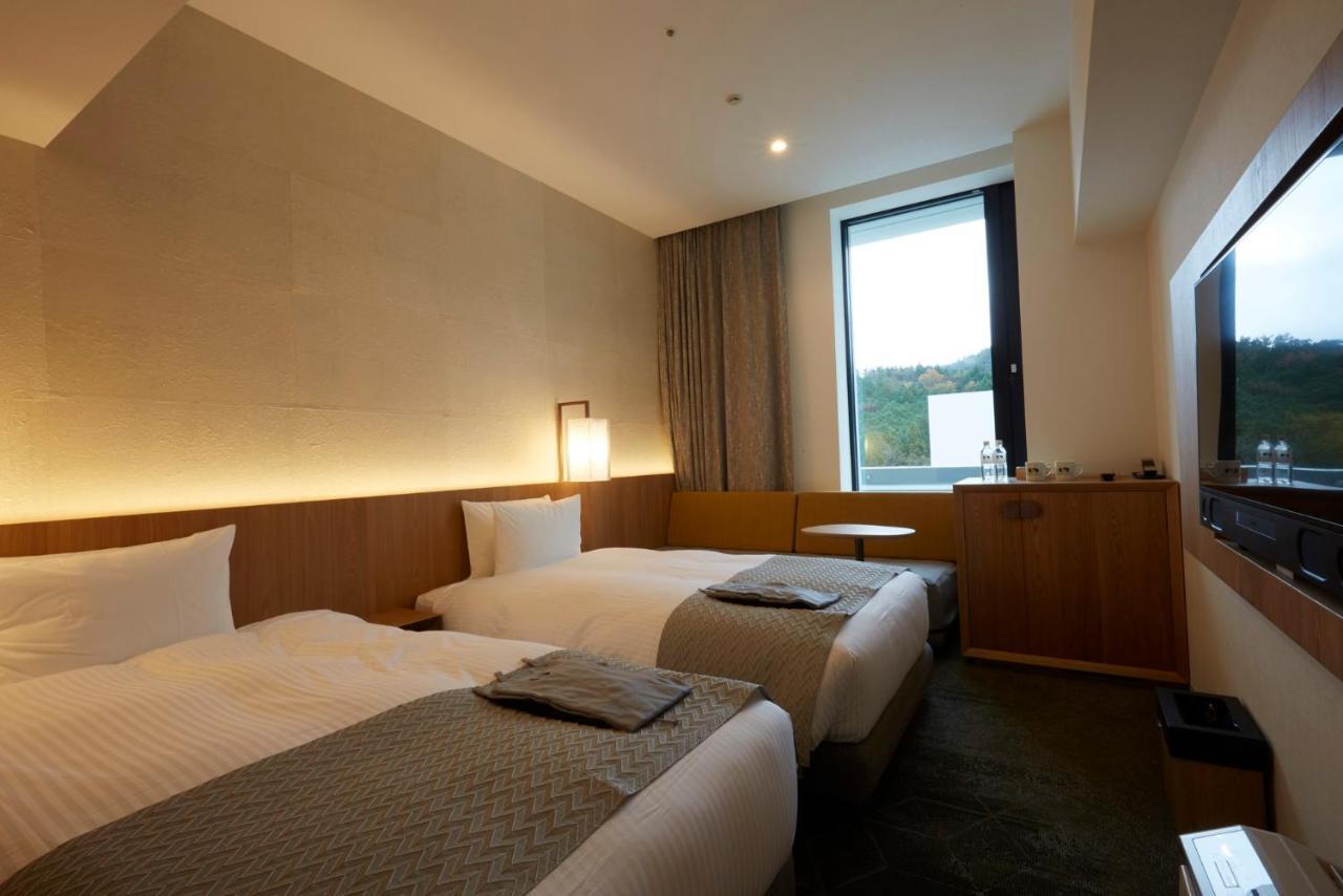 גוטמבה Hotel Clad מראה חיצוני תמונה