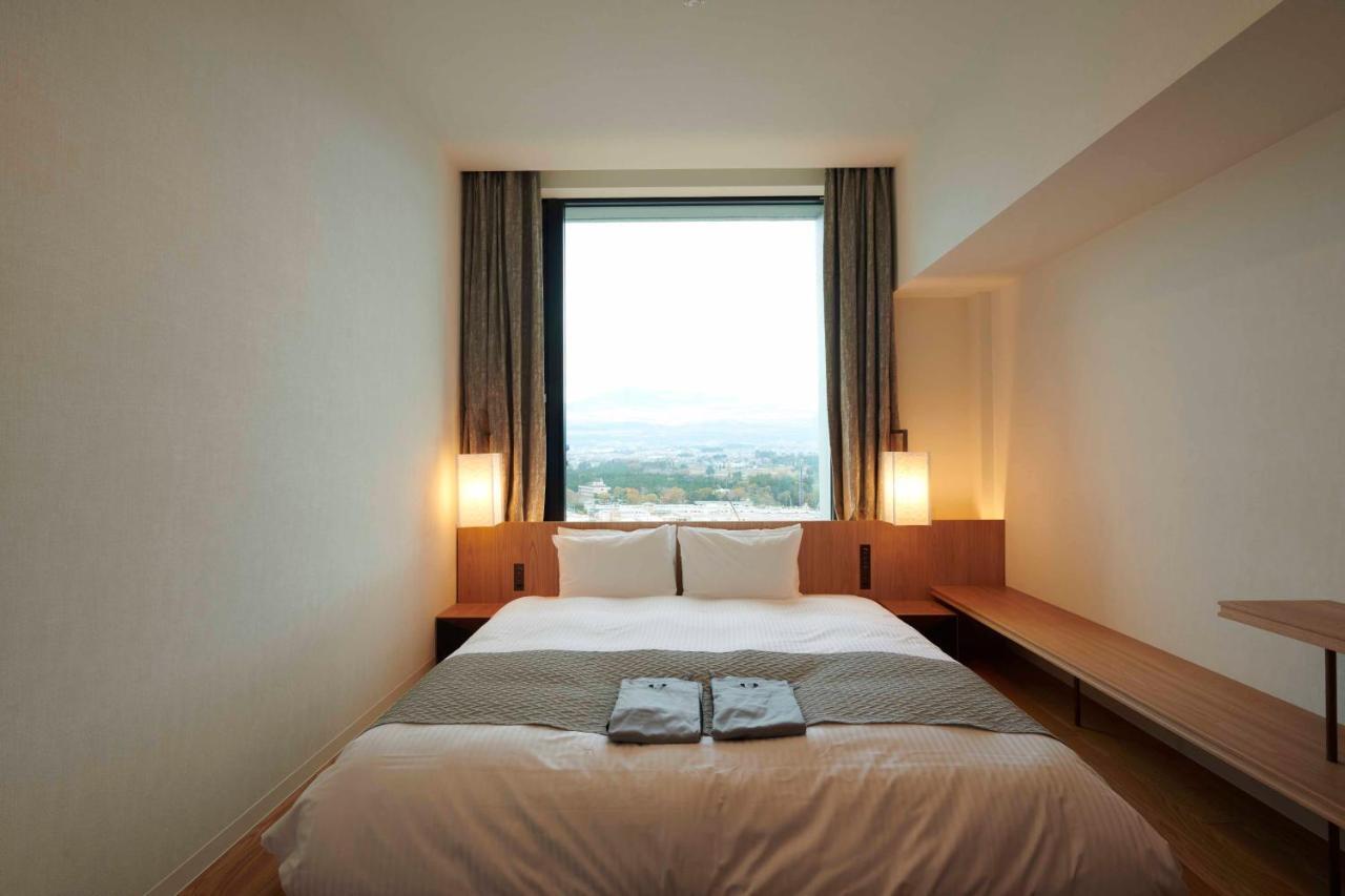 גוטמבה Hotel Clad מראה חיצוני תמונה